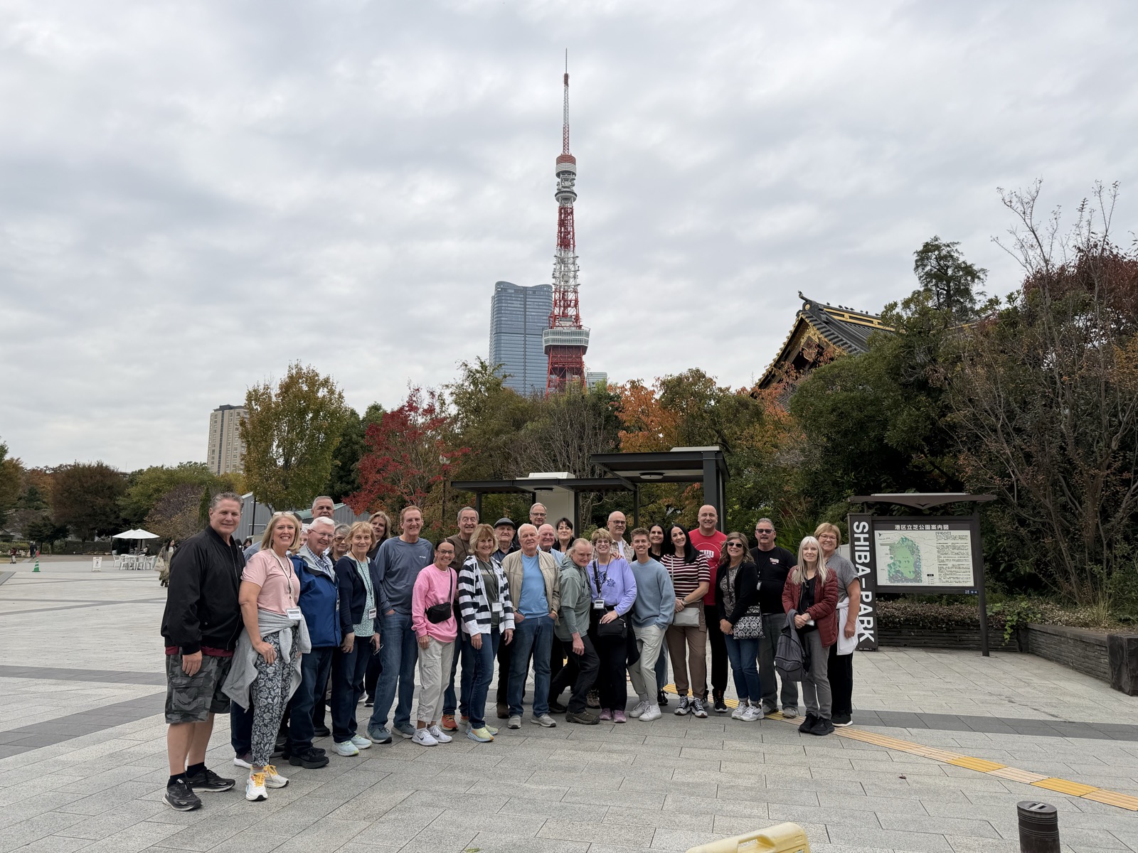 Tour group photo in front of Tokyo Tower with private guide Mao