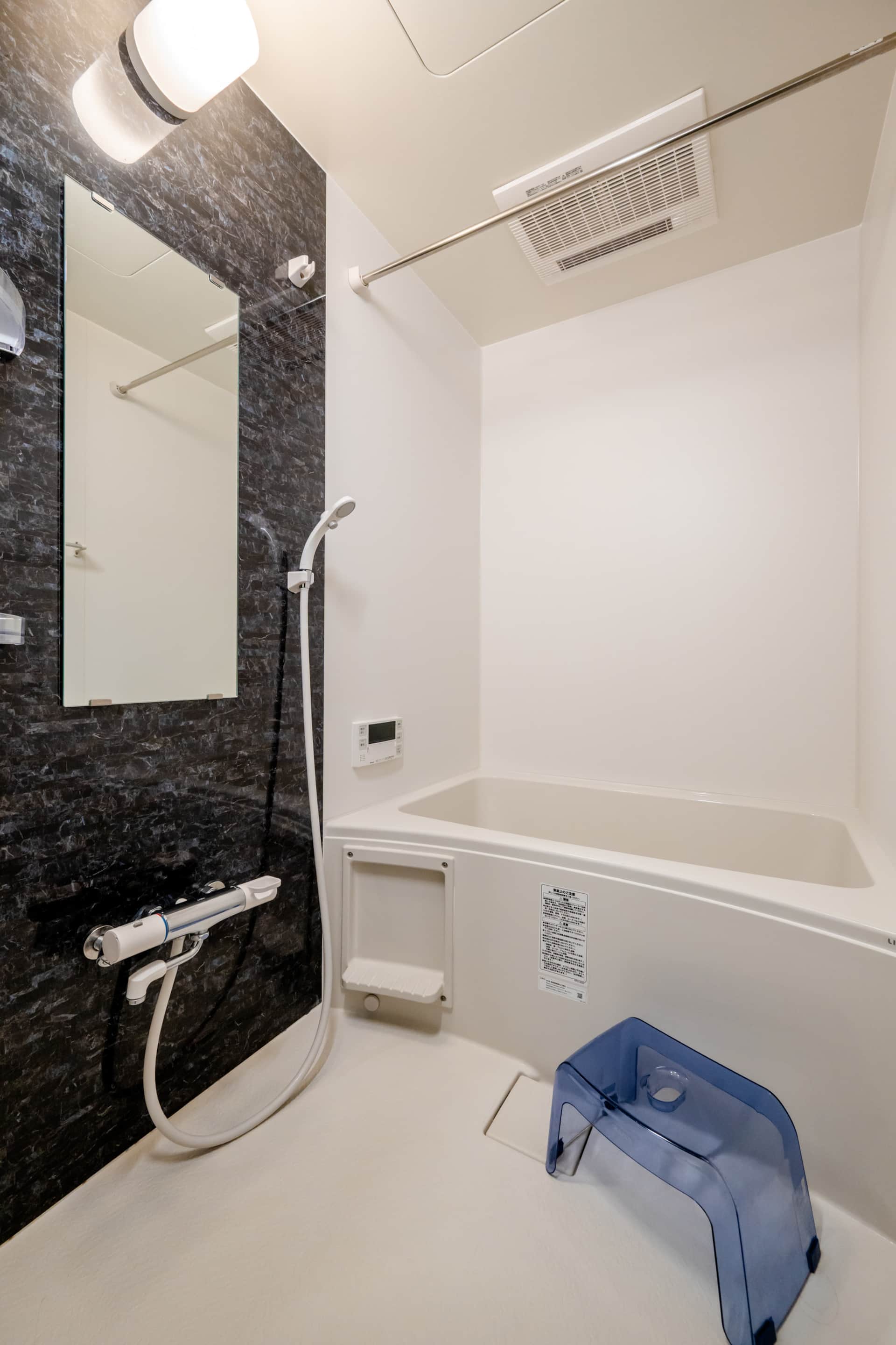 Modern private bathroom at our Namba East Osaka apartment — new 2022 build